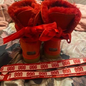 Woman’s red Ugg boots size 8